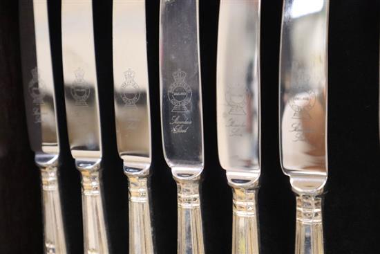 A canteen of Kings pattern silver plated cutlery in a mahogany free-standing canteen.